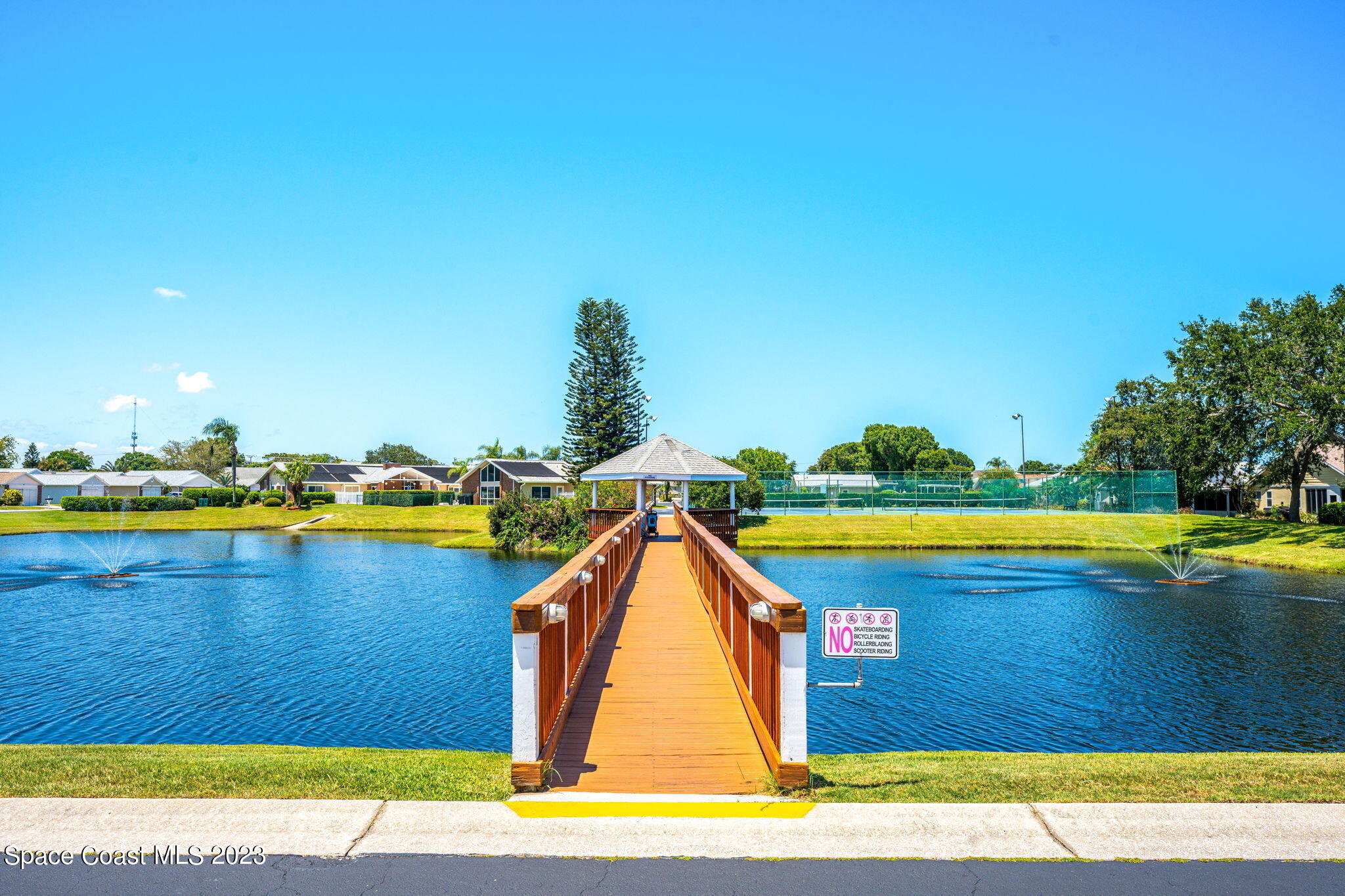 840 Cross Lake Drive Melbourne, FL 32901 - Photo 51 of 63 a view of swimming pool with an outdoor space and seating area
