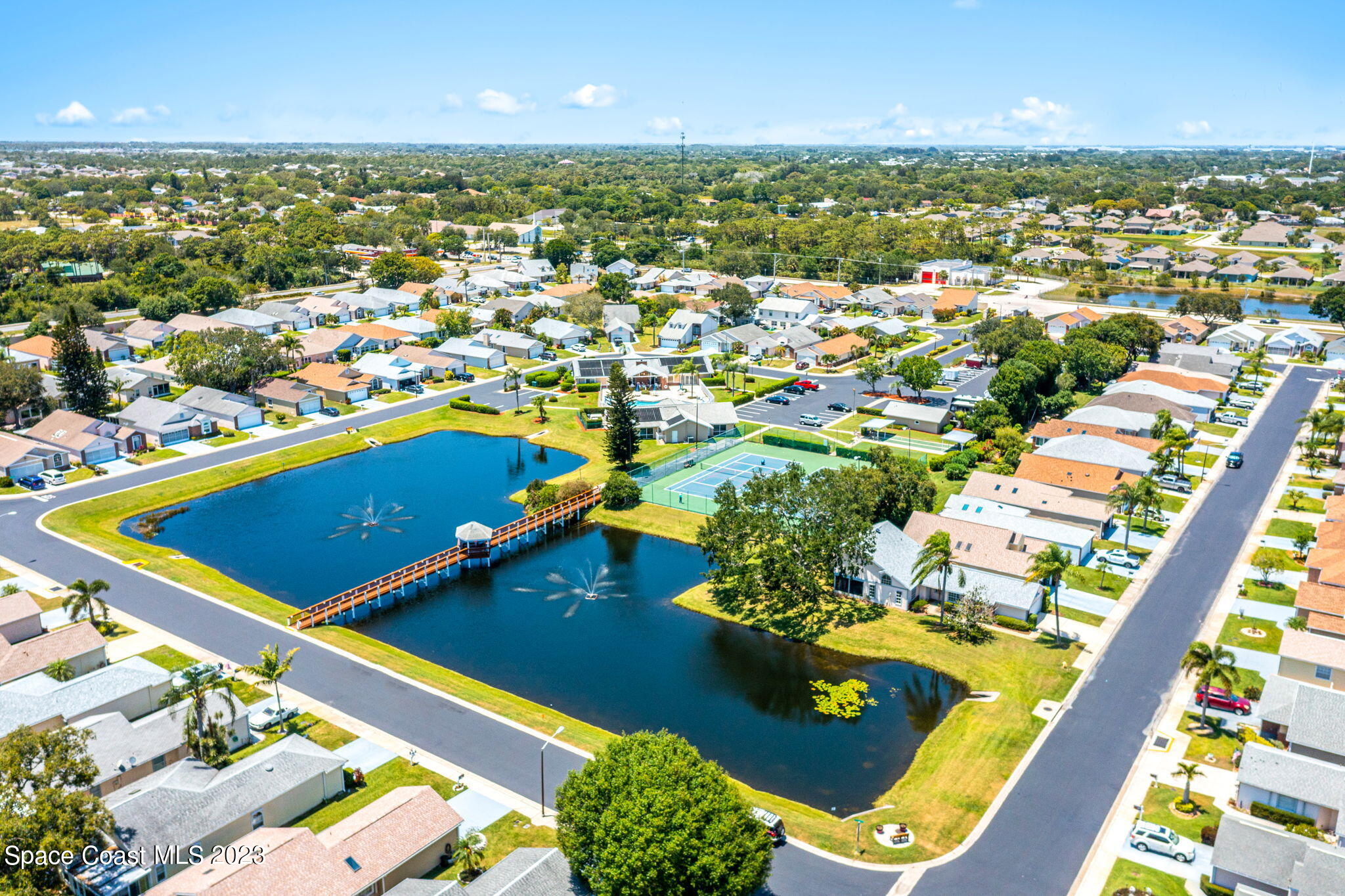 840 Cross Lake Drive Melbourne, FL 32901 - Photo 56 of 63 an aerial view of residential houses with outdoor space