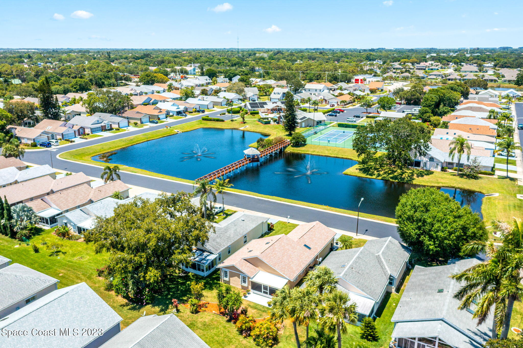 840 Cross Lake Drive Melbourne, FL 32901 - Photo 57 of 63 an aerial view of residential houses with outdoor space and swimming pool