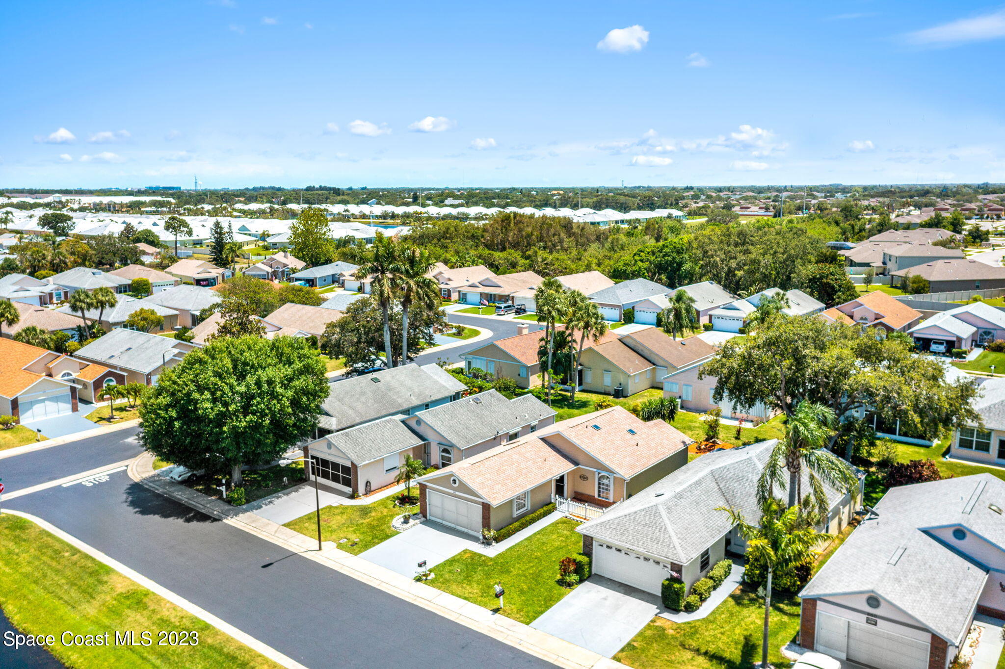 840 Cross Lake Drive Melbourne, FL 32901 - Photo 60 of 63 an aerial view of residential houses with outdoor space and swimming pool