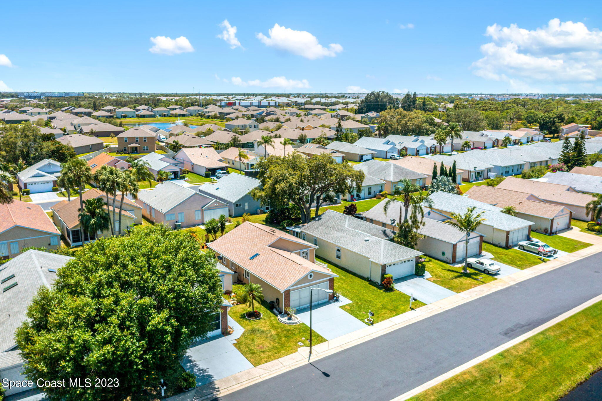 840 Cross Lake Drive Melbourne, FL 32901 - Photo 61 of 63 an aerial view of residential houses with outdoor space