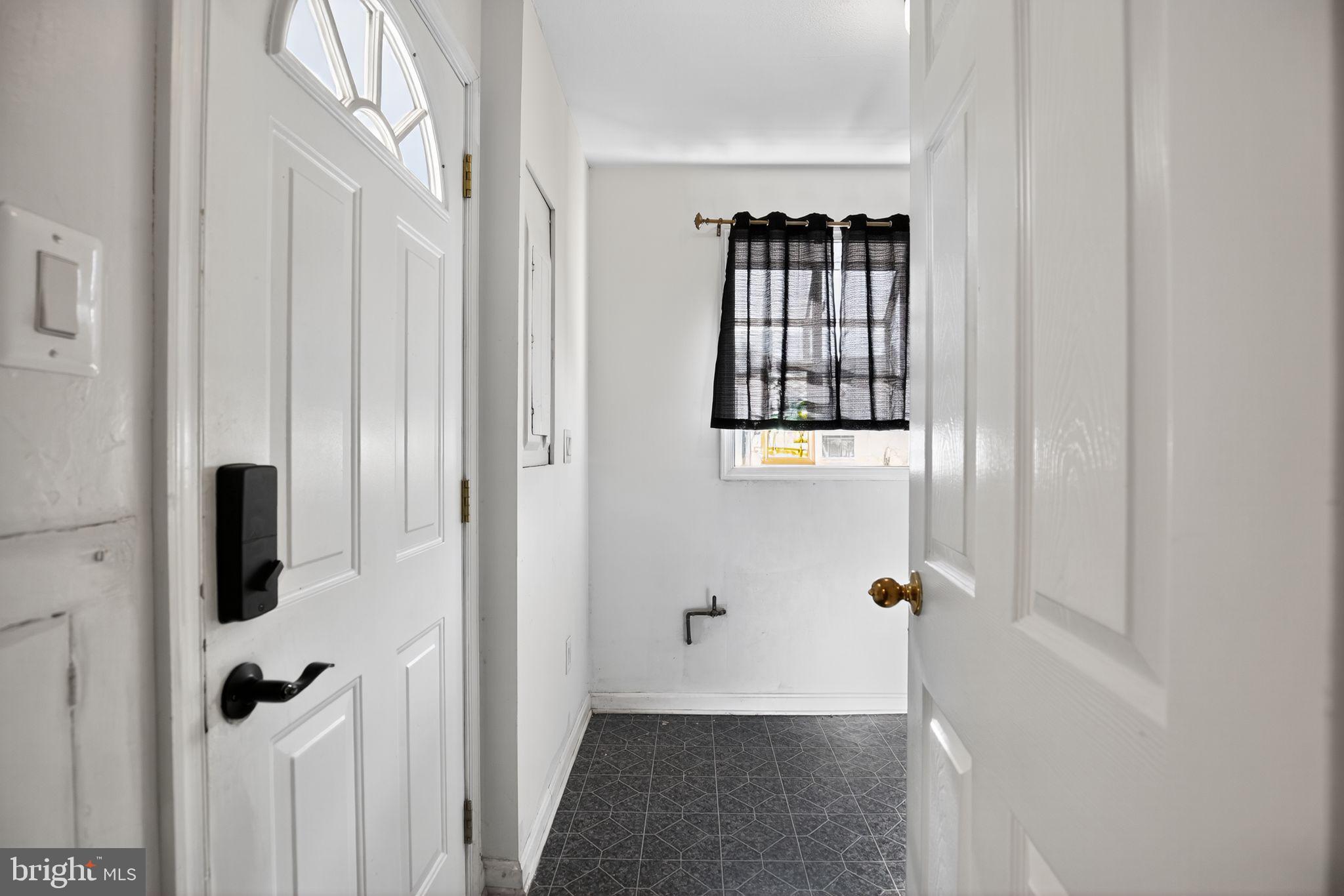 7726 Wills Lane Fort Washington, MD 20744 - Photo 13 of 30 a view of a livingroom with a window