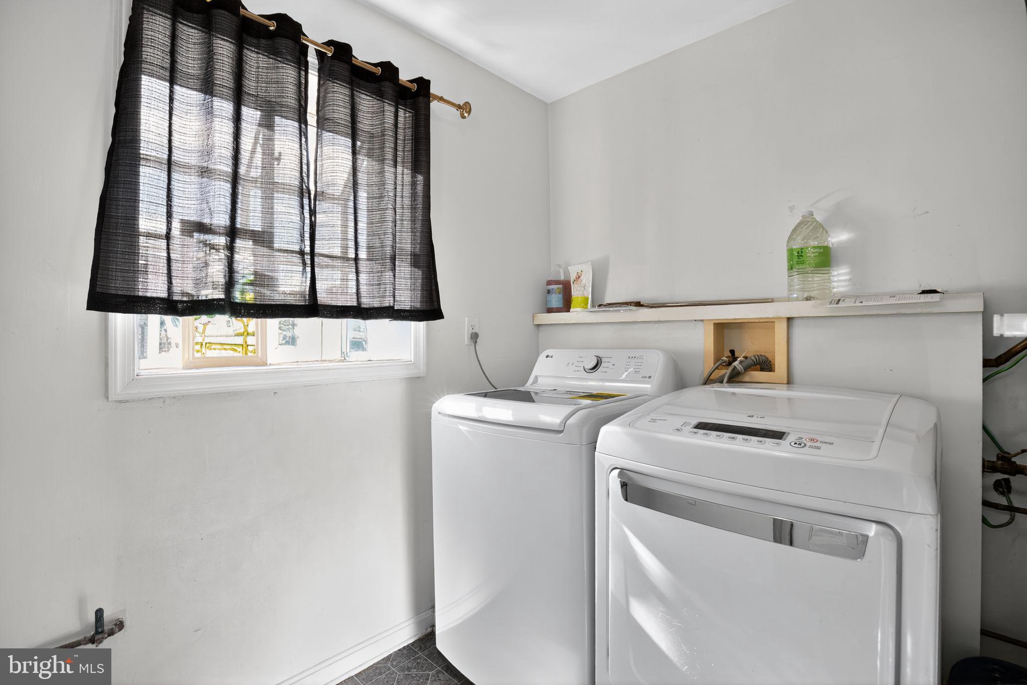 7726 Wills Lane Fort Washington, MD 20744 - Photo 14 of 30 a utility room with dryer and washer