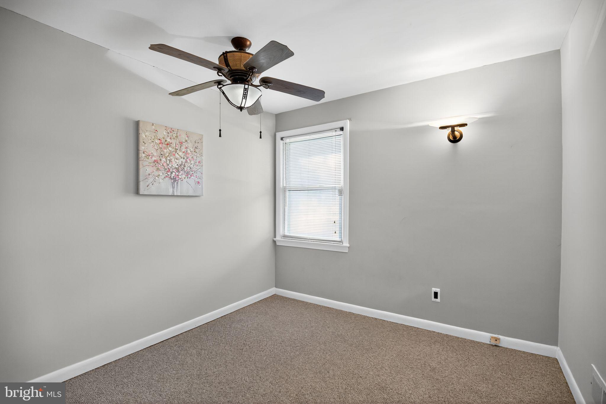 7726 Wills Lane Fort Washington, MD 20744 - Photo 16 of 30 a view of an empty room with a window