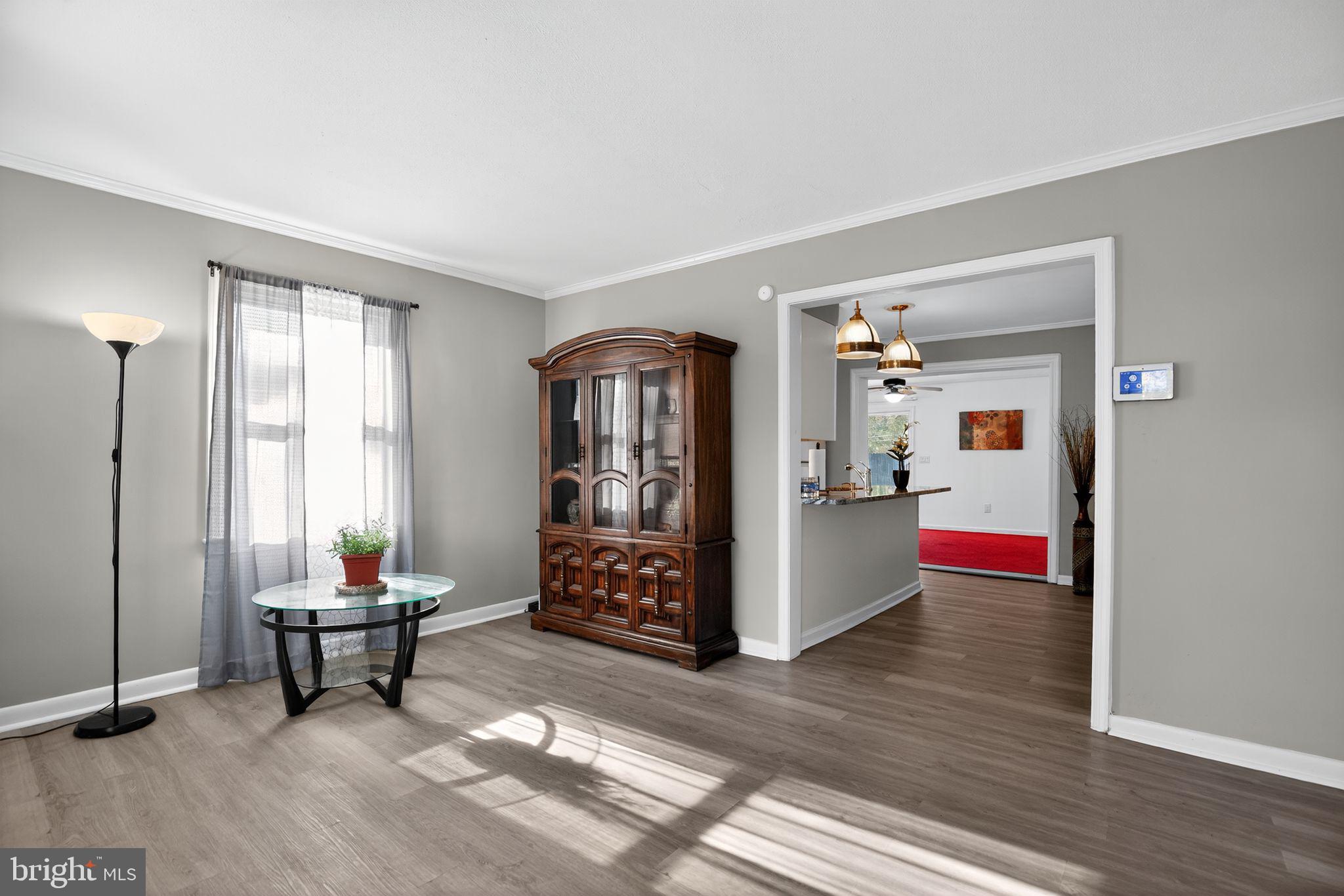 7726 Wills Lane Fort Washington, MD 20744 - Photo 5 of 30 a living room with furniture and a window