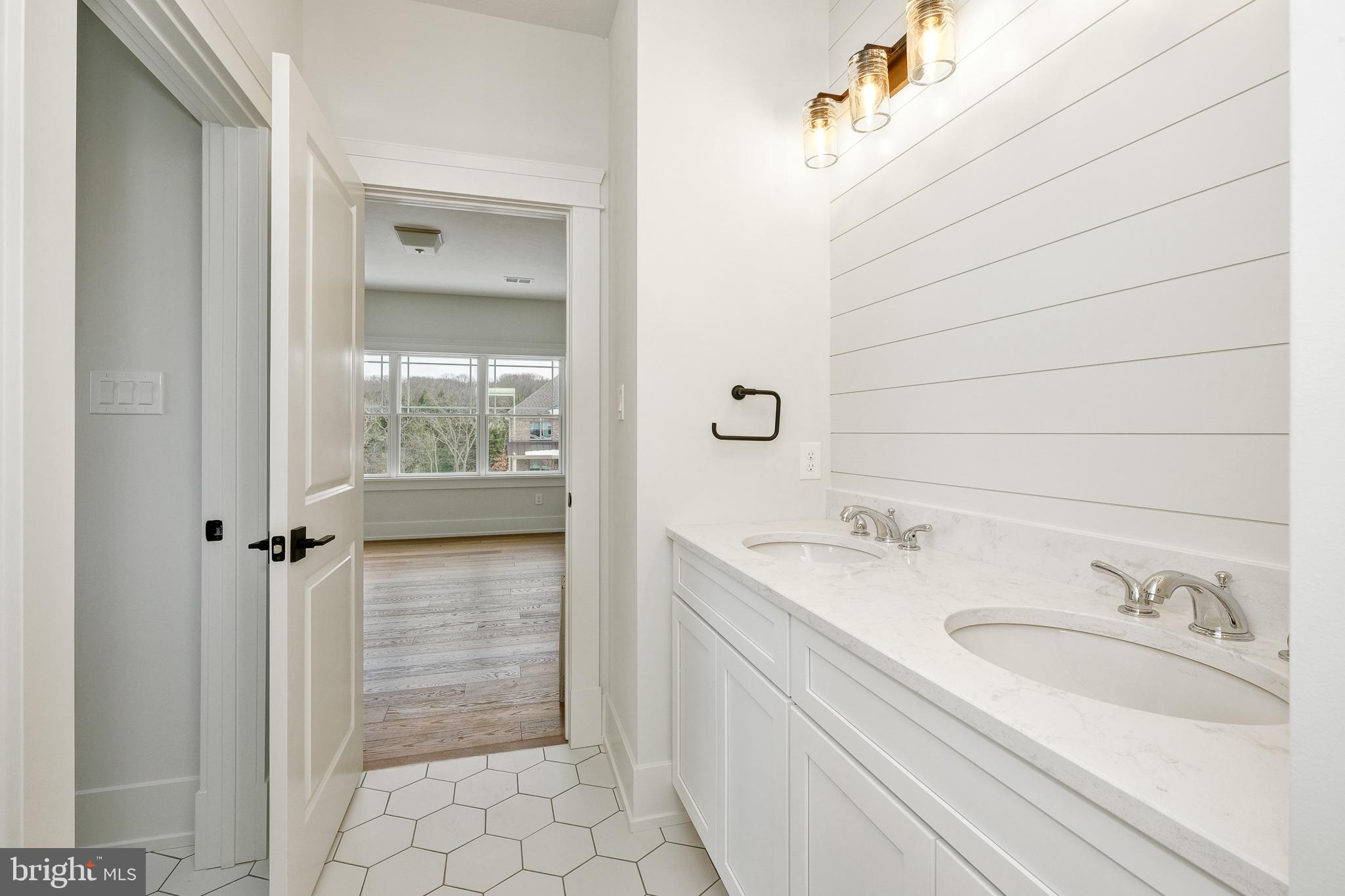 3155 Ridgeview Court, Unit 5 Garnet Valley, PA 19060 - Photo 47 of 55 jack & jill bathroom entrance from bedroom 4