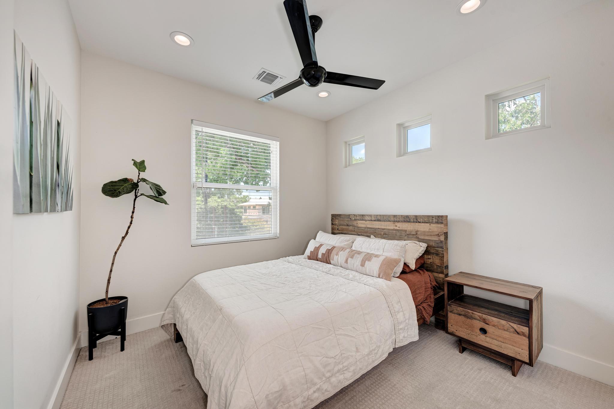 918 Cardinal Lane, Unit A Austin, TX 78704 - Photo 22 of 40 Two additional bedrooms and a stylish full guest bathroom offer space for family, guests, and more.