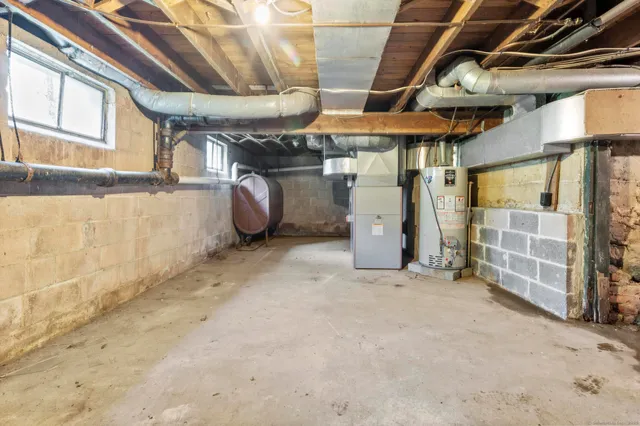 a view of a room with wooden walls