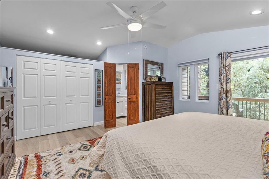 172 North Vireo Drive McKees Rocks, PA 15136 - Photo 19 of 41 a bedroom with a large bed and a chandelier