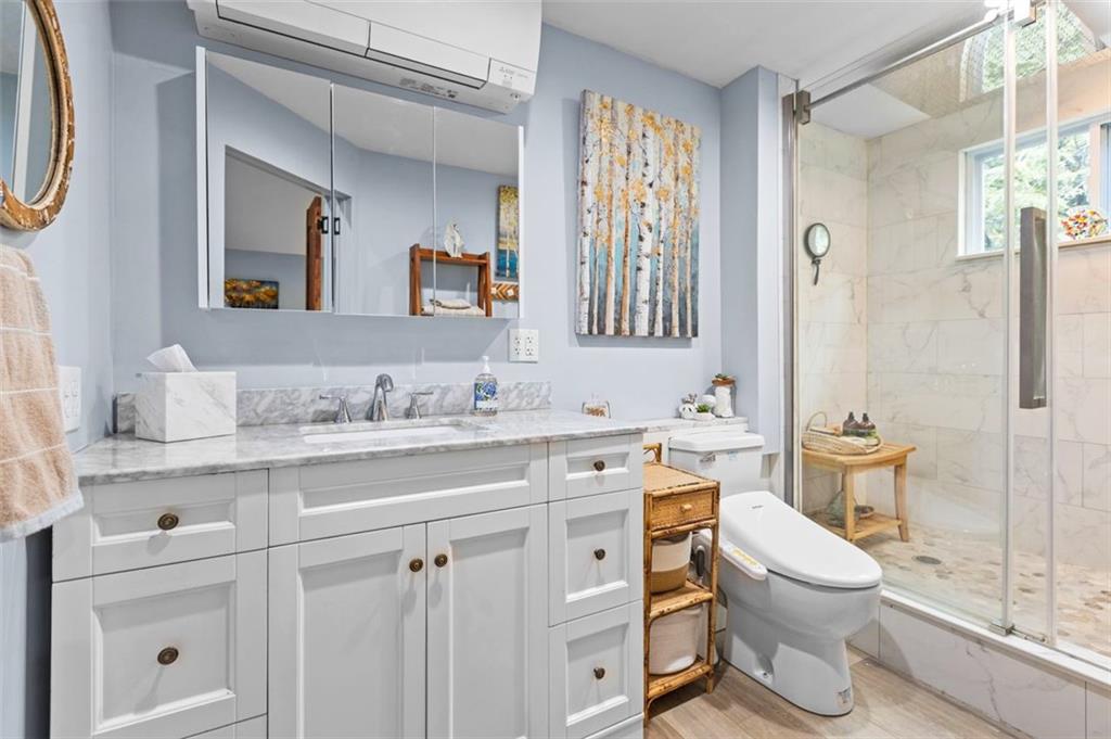 172 North Vireo Drive McKees Rocks, PA 15136 - Photo 20 of 41 a bathroom with a granite countertop toilet sink and a mirror