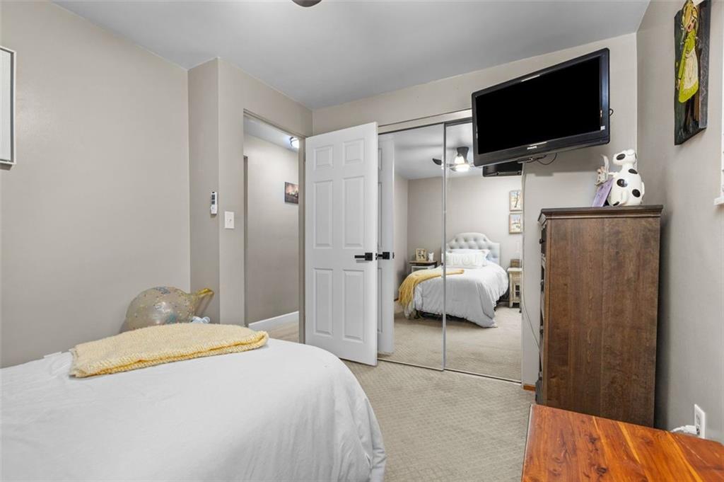 172 North Vireo Drive McKees Rocks, PA 15136 - Photo 26 of 41 a bedroom with a bed and a flat screen tv