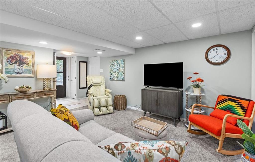 172 North Vireo Drive McKees Rocks, PA 15136 - Photo 28 of 41 a living room with furniture and a flat screen tv