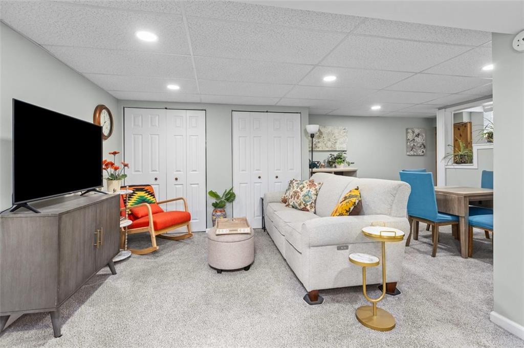 172 North Vireo Drive McKees Rocks, PA 15136 - Photo 29 of 41 a living room with furniture and a flat screen tv