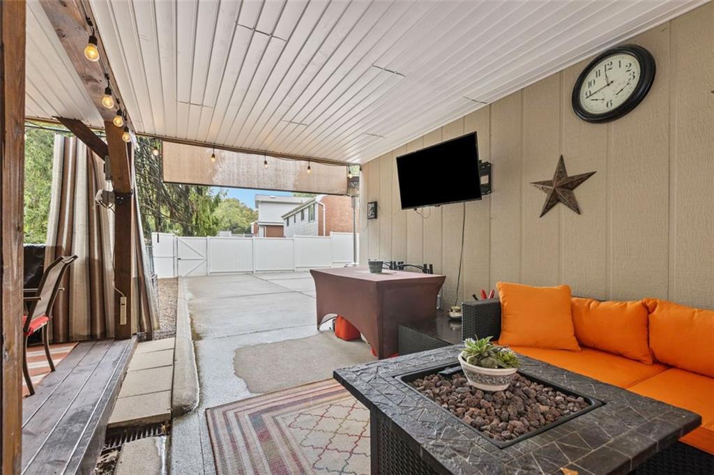 172 North Vireo Drive McKees Rocks, PA 15136 - Photo 38 of 41 a living room with furniture and a flat screen tv
