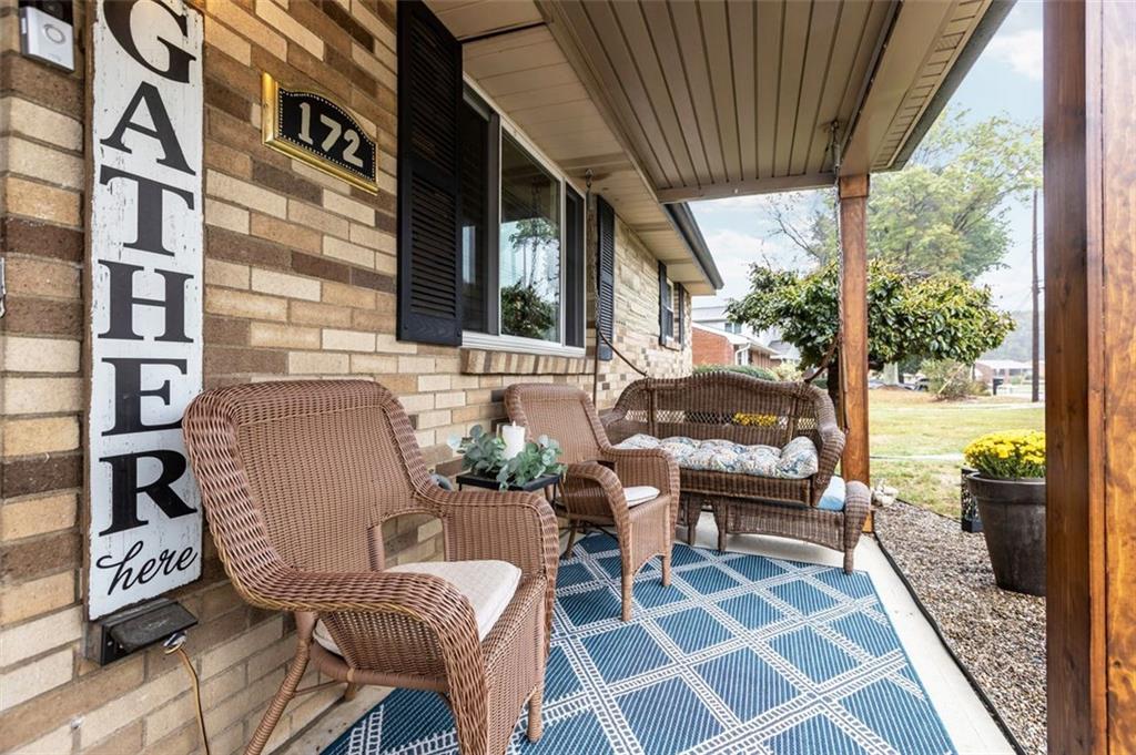 172 North Vireo Drive McKees Rocks, PA 15136 - Photo 4 of 41 a view of a patio with a table chairs and backyard