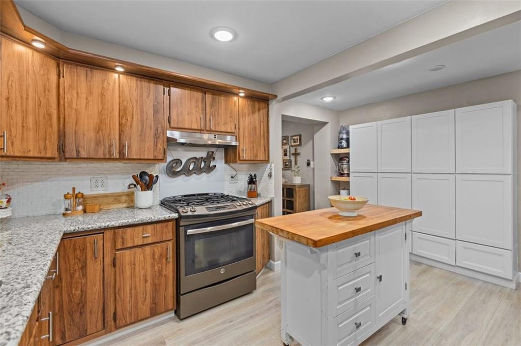 172 North Vireo Drive McKees Rocks, PA 15136 - Photo 10 of 41 a kitchen with granite countertop cabinets stainless steel appliances and a counter space
