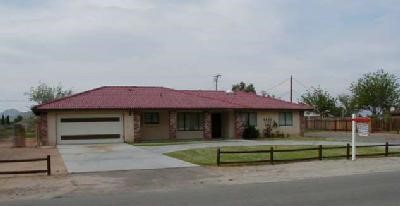 20296 Itasca Road Apple Valley, CA 92308 - Photo 1 of 1 a view of a house with a garden and deck