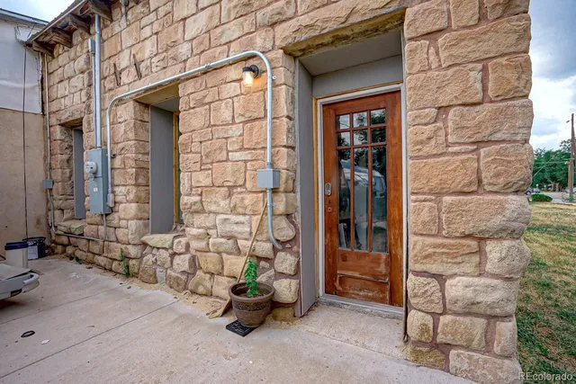 a view of entrance door of house