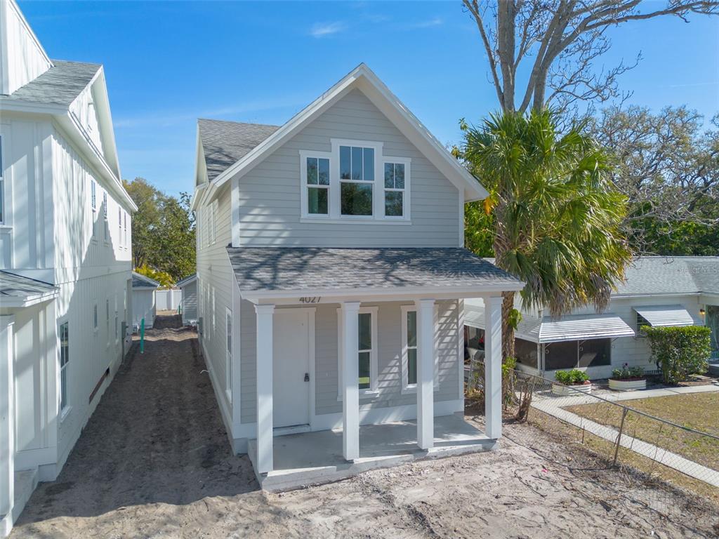 4027 Haines Road North St. Petersburg, FL 33703 - Photo 5 of 13 a front view of a house with a porch