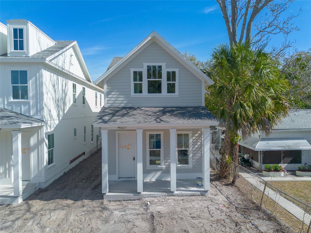 4027 Haines Road North St. Petersburg, FL 33703 - Photo 7 of 13 a front view of a house with a yard