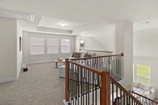 a view of hallway with livingroom