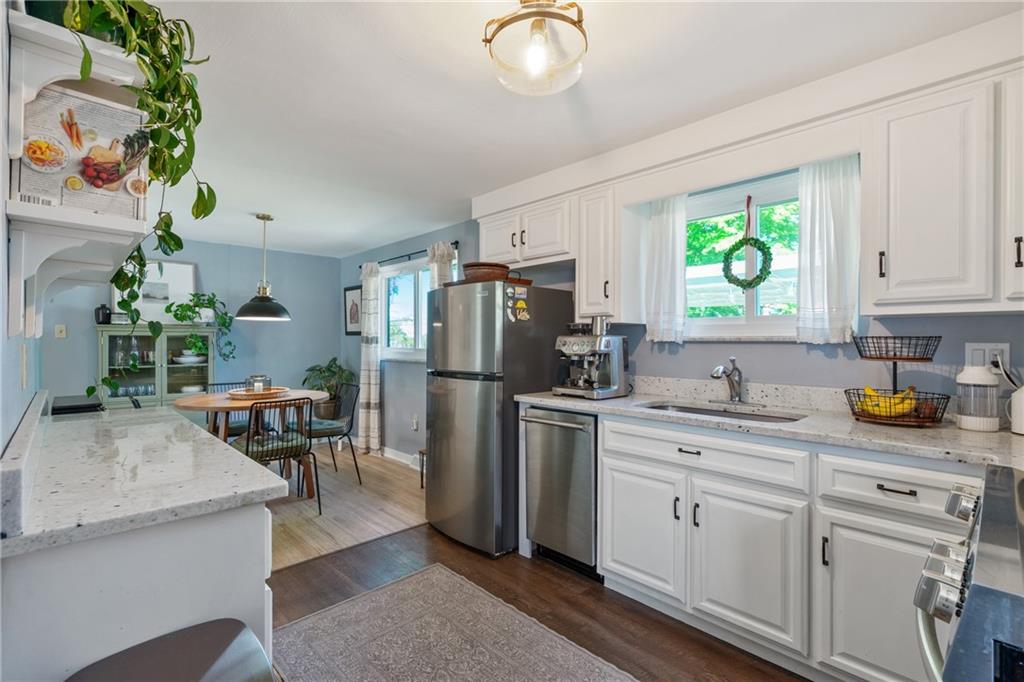 901 Braddock Road Pittsburgh, PA 15221 - Photo 13 of 30 Kitchen and dining area offer a bright, open space.