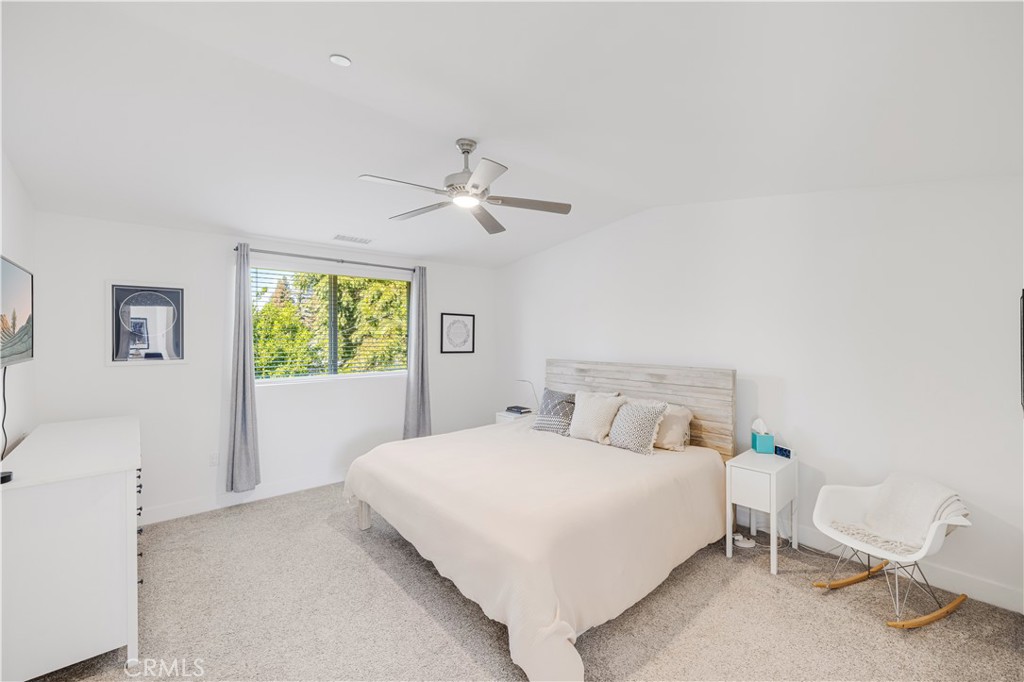 6747 Rhea Court Reseda, CA 91335 - Photo 17 of 26 a bedroom with a bed and a window