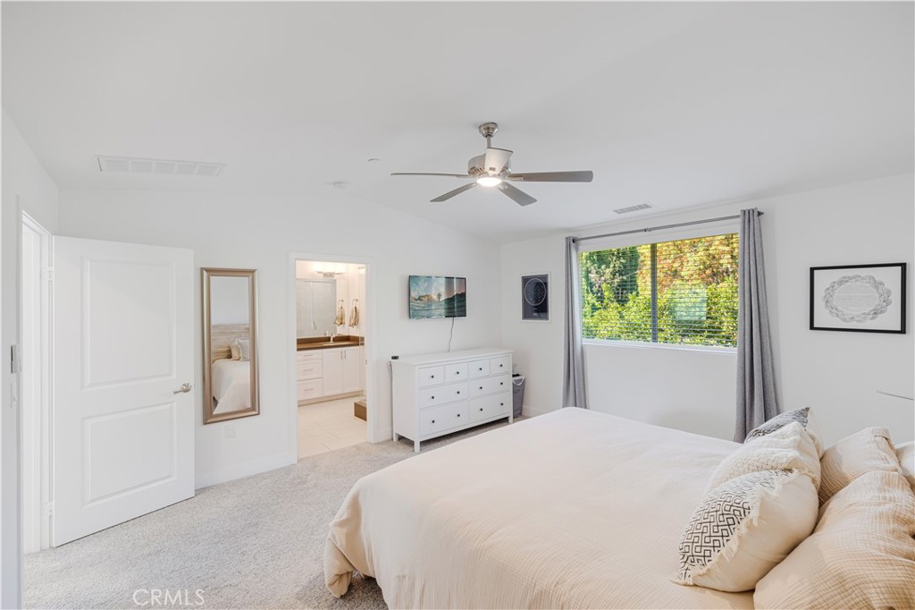 6747 Rhea Court Reseda, CA 91335 - Photo 18 of 26 a bedroom with a large bed and a window