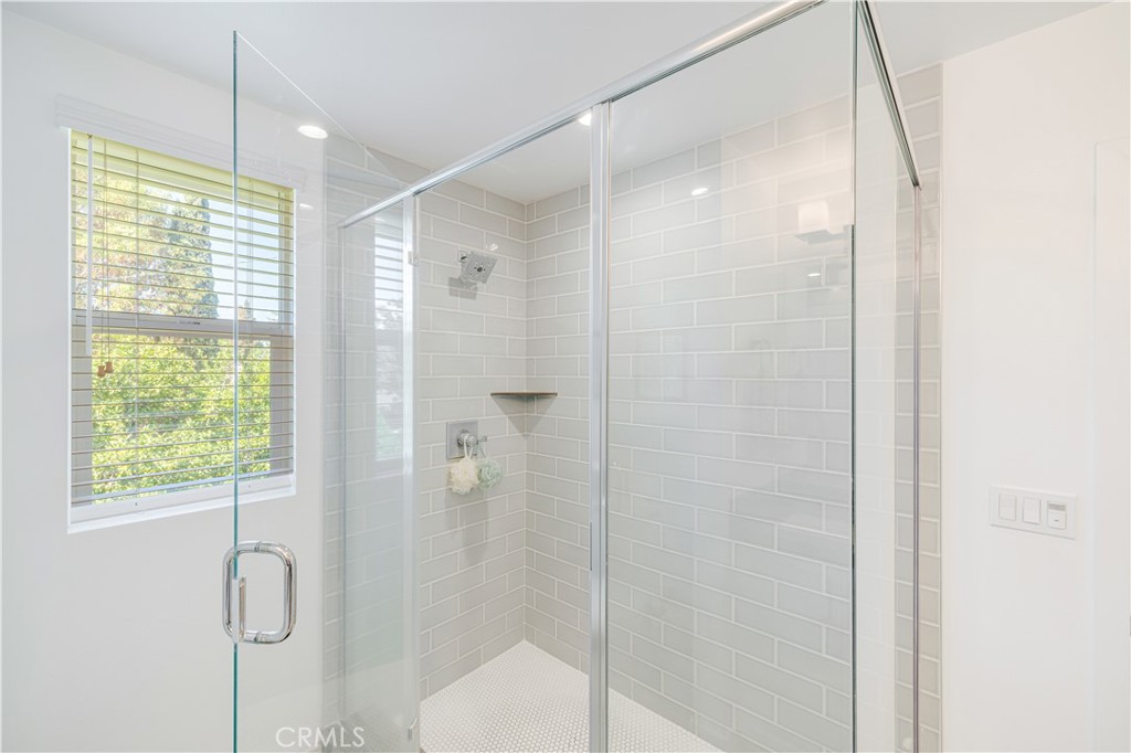 6747 Rhea Court Reseda, CA 91335 - Photo 20 of 26 a bathroom with a shower and a sink