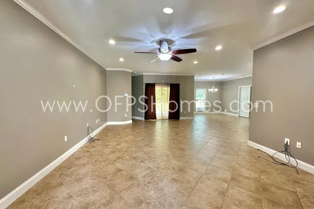 a view of a livingroom with a kitchen