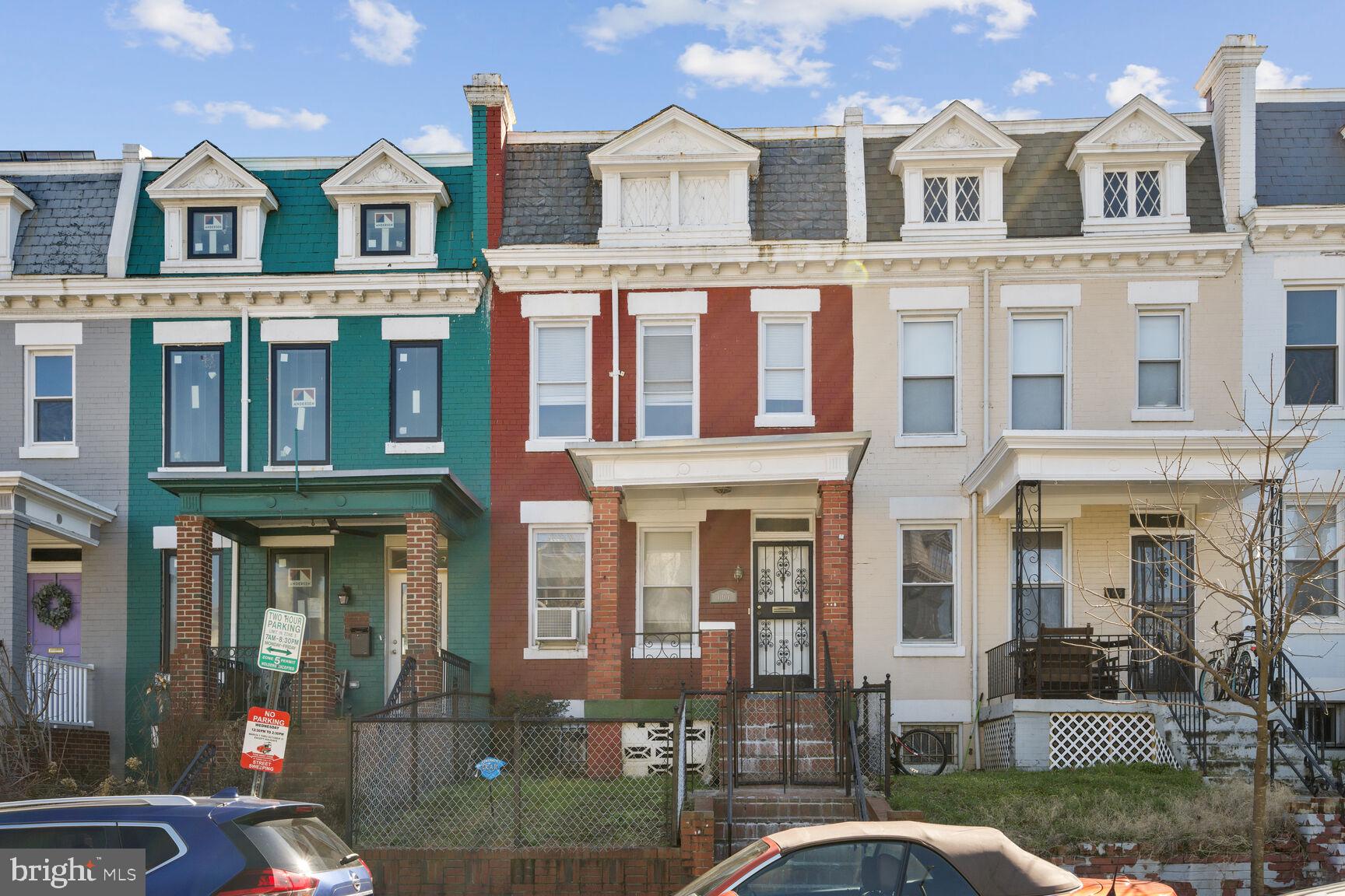 Charming row homes in vibrant hues.