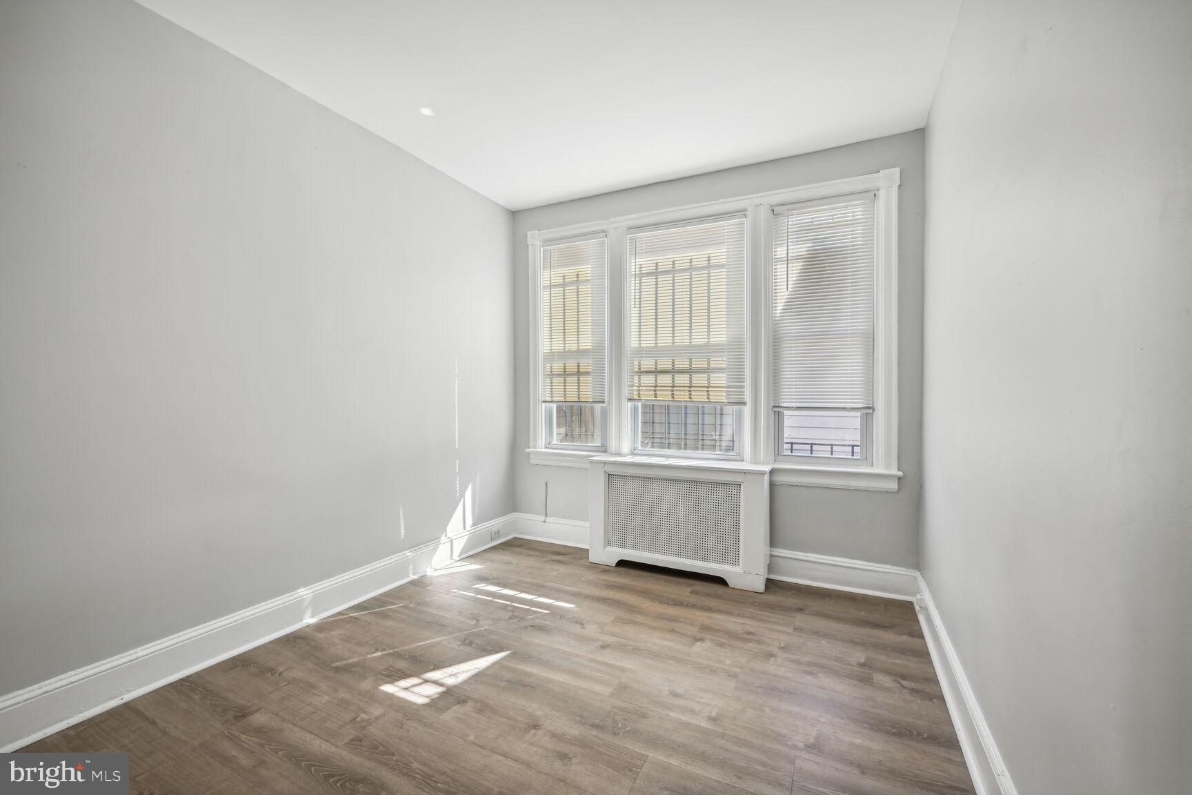 167 V Street Northeast Washington, DC 20002 - Photo 3 of 21 Bright and airy room with sunlight.