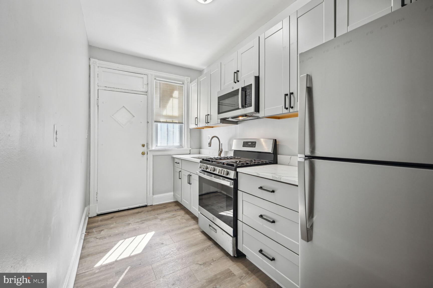 167 V Street Northeast Washington, DC 20002 - Photo 5 of 21 Bright and modern kitchen space.