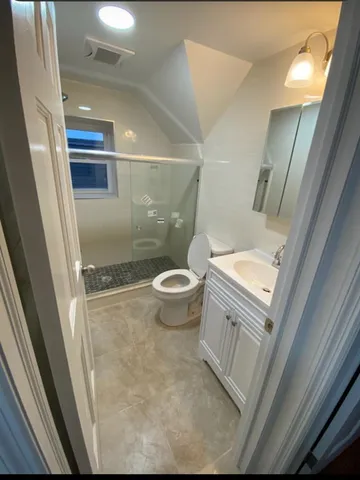 a bathroom with a sink and toilet