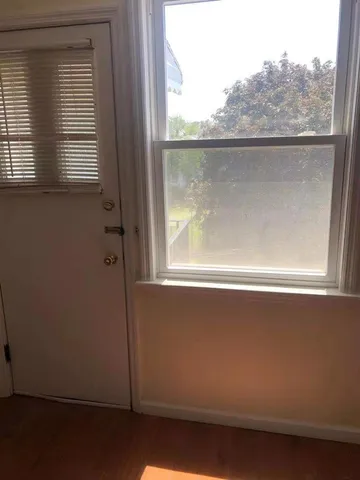 a view of a window in an empty room