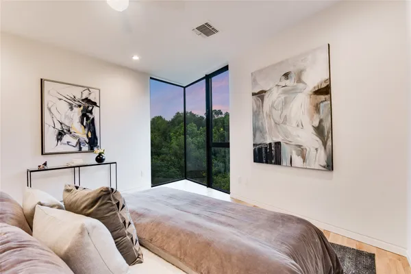 a view of a livingroom with furniture and wooden floor
