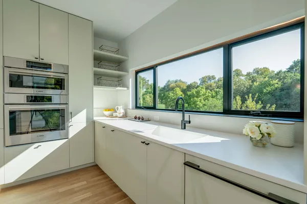 a view of a dining room with furniture window and outside view