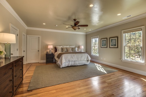 24 Burroughs Road Lexington, MA 02420 - Photo 20 of 30 a bedroom with a bed and wooden floor