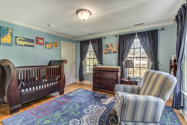 24 Burroughs Road Lexington, MA 02420 - Photo 25 of 30 a living room with furniture and a window