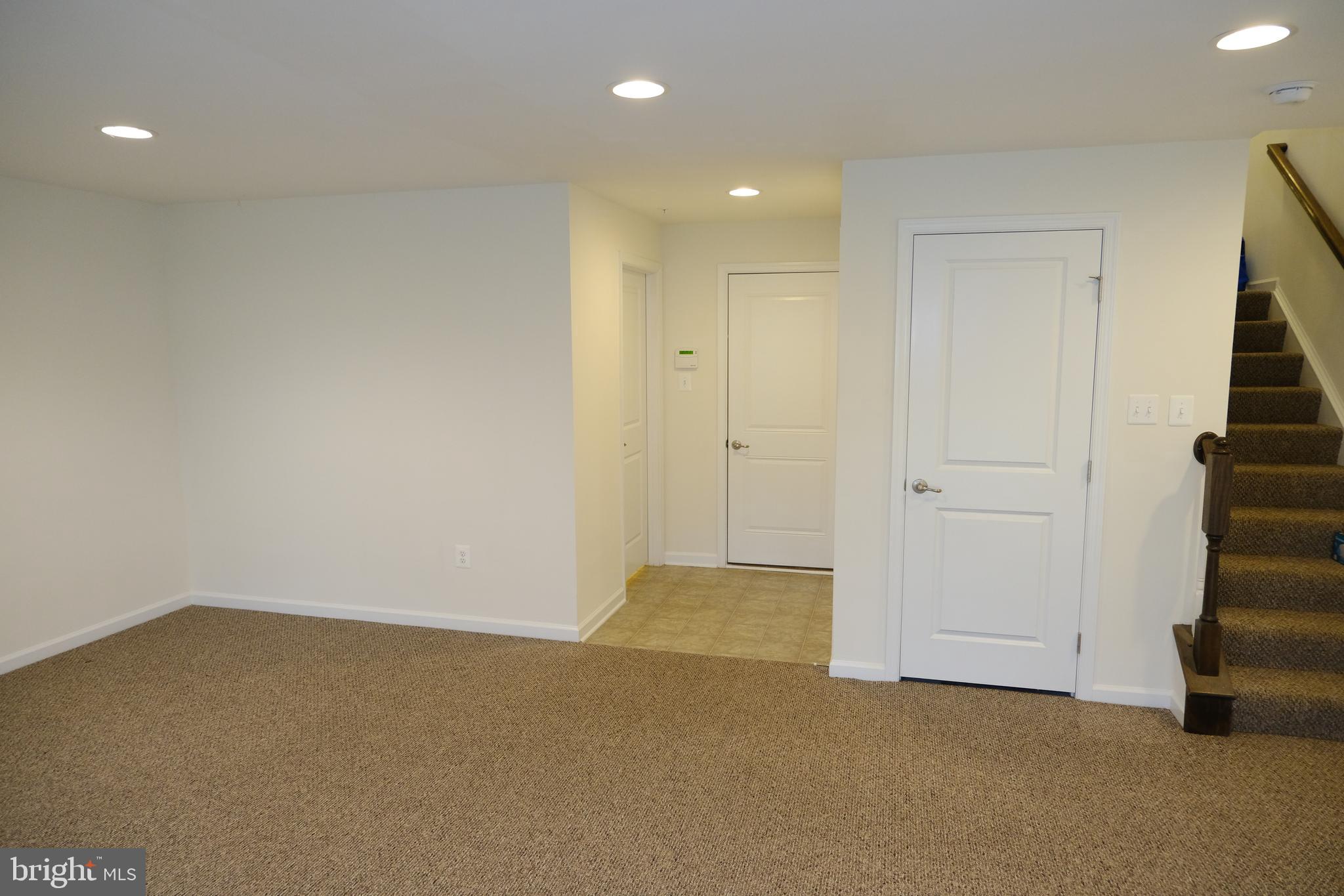 6254 Ritter Drive Frederick, MD 21703 - Photo 33 of 41 Lower level -game room, full bath, utility, garage
