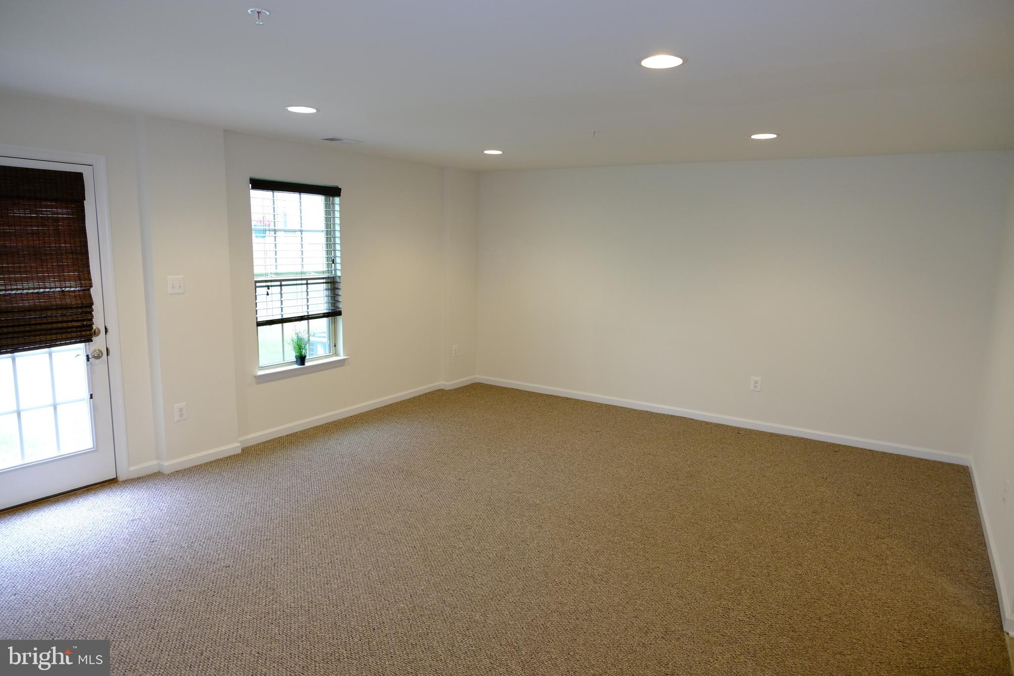6254 Ritter Drive Frederick, MD 21703 - Photo 34 of 41 Spacious family room with walkout to back