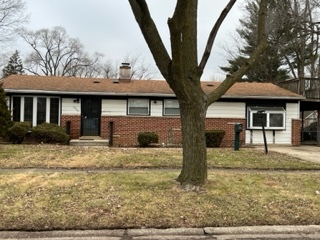 2726 Lancaster Drive Markham, IL 60428 - Photo 2 of 13 a front view of a house with garden