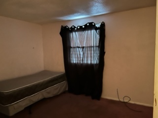 2726 Lancaster Drive Markham, IL 60428 - Photo 9 of 13 a view of walk in closet with clothes and shoes