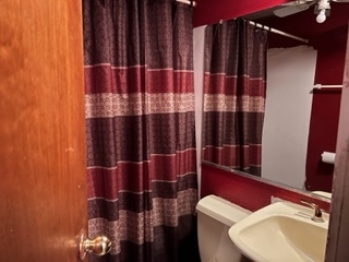 2726 Lancaster Drive Markham, IL 60428 - Photo 10 of 13 a bathroom with a sink toilet and shower