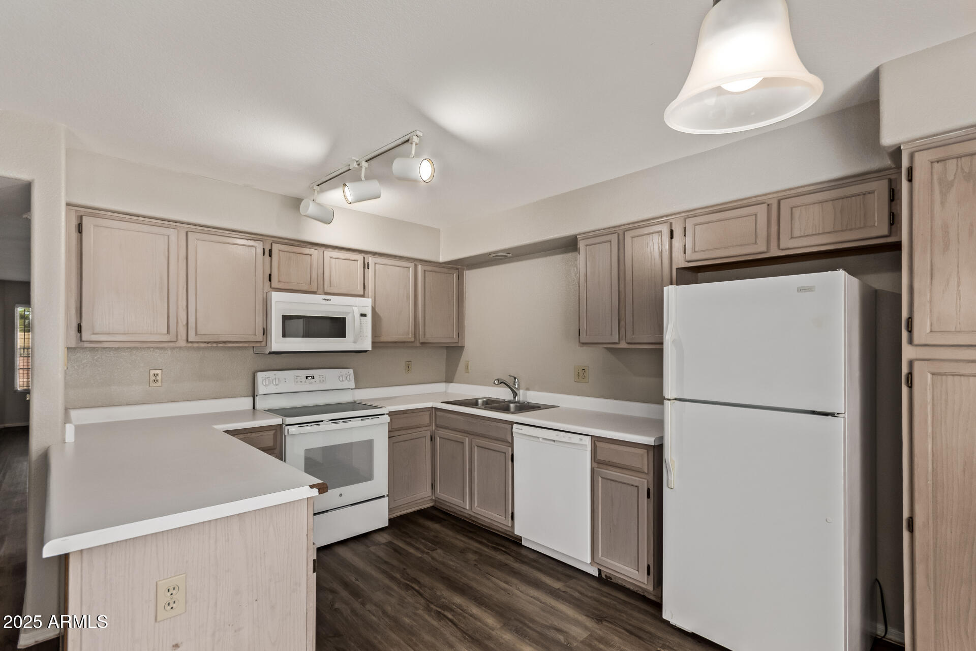 2875 West Highland Street, Unit 1112 Chandler, AZ 85224 - Photo 11 of 33 a kitchen with a refrigerator sink and microwave