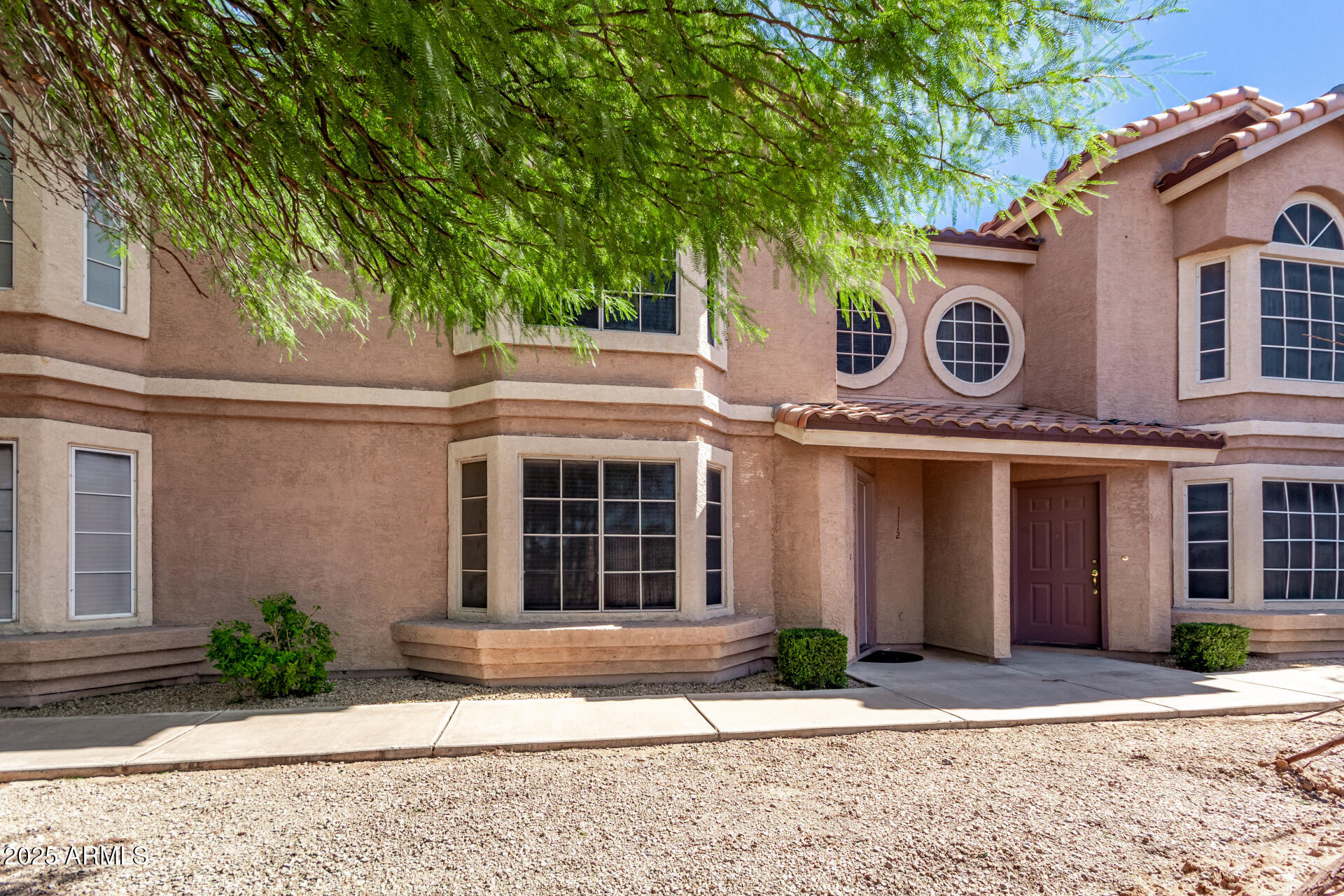 2875 West Highland Street, Unit 1112 Chandler, AZ 85224 - Photo 2 of 33 a view of a house with a outdoor space
