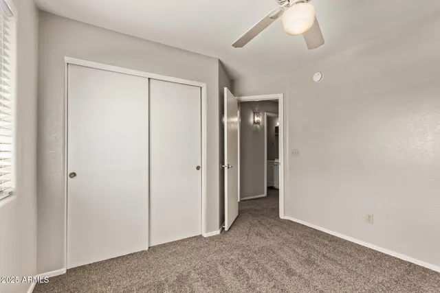 a view of hallway with closet