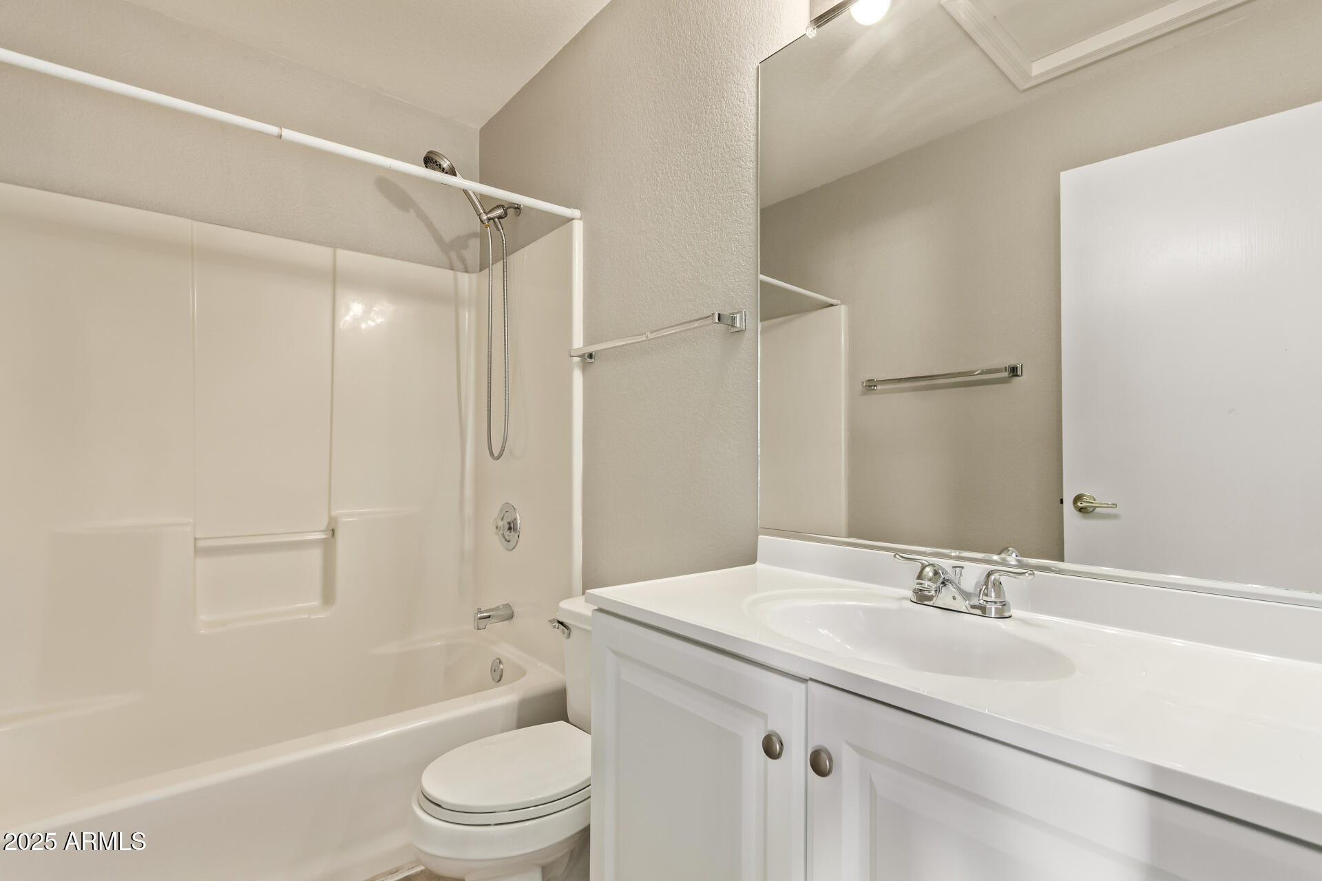 2875 West Highland Street, Unit 1112 Chandler, AZ 85224 - Photo 24 of 33 a bathroom with a sink a toilet and shower