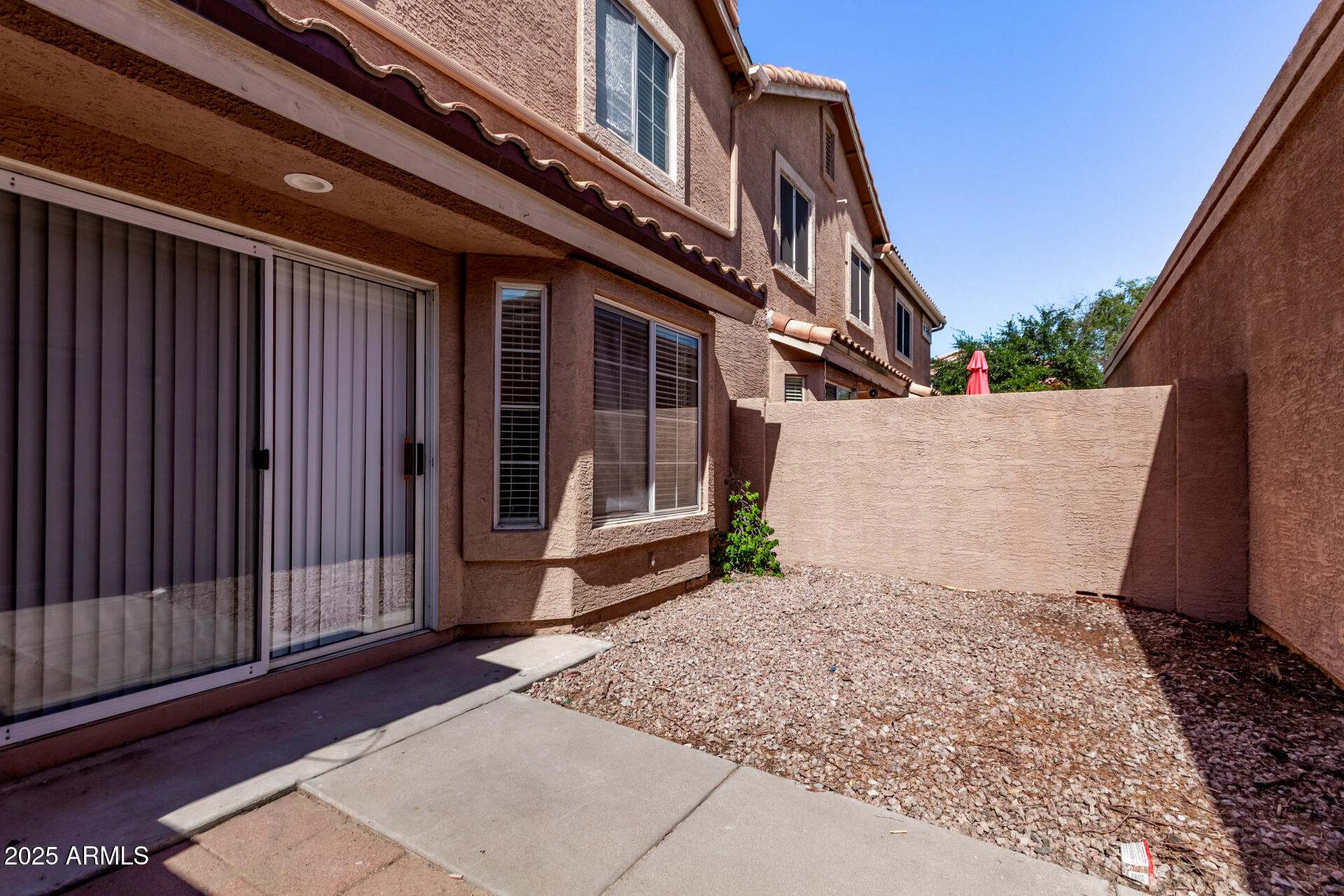 2875 West Highland Street, Unit 1112 Chandler, AZ 85224 - Photo 27 of 33 a view of a house with a door
