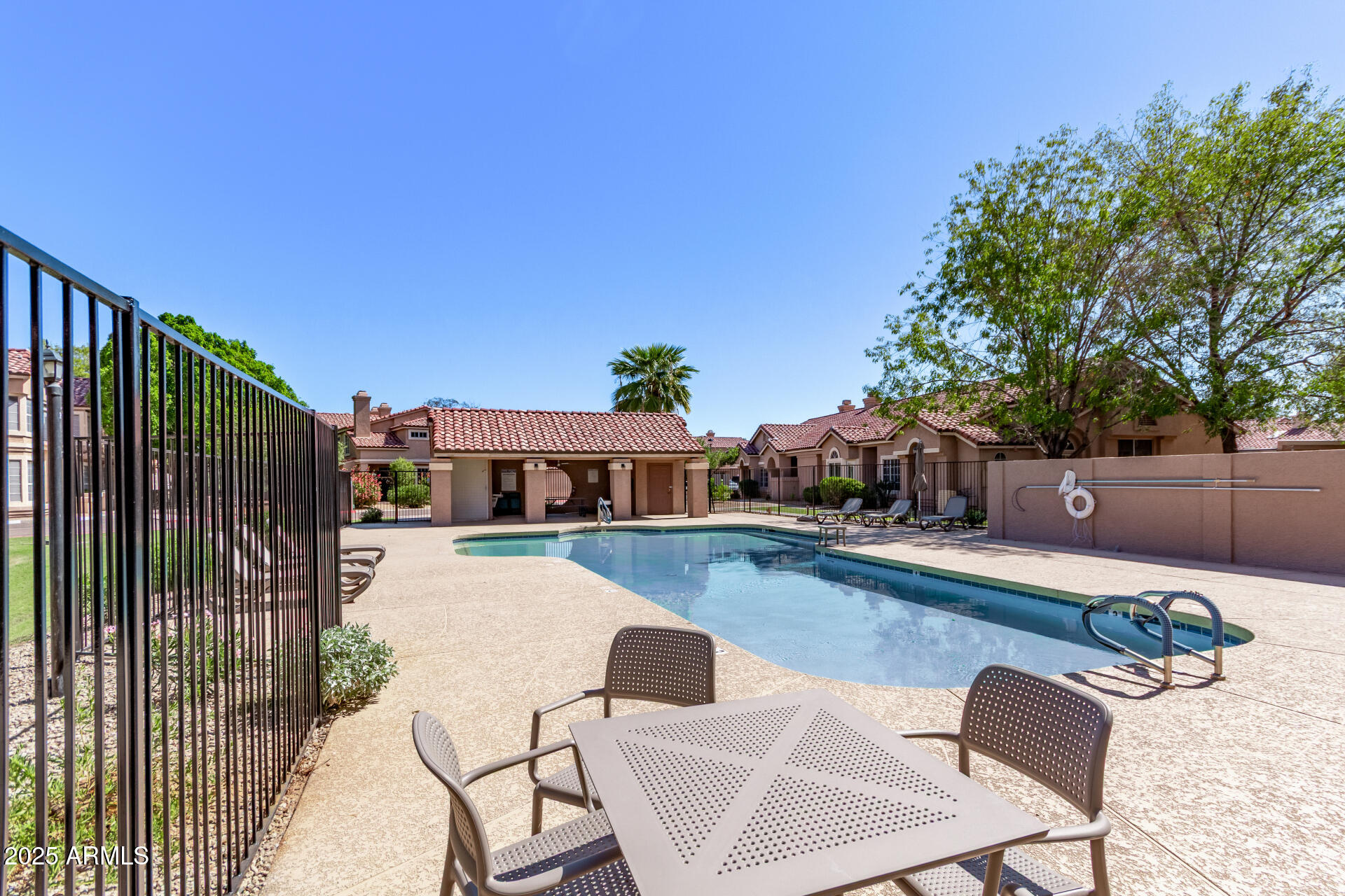 2875 West Highland Street, Unit 1112 Chandler, AZ 85224 - Photo 32 of 33 a view of a patio with swimming pool